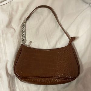 Brown tortoise shell purse
